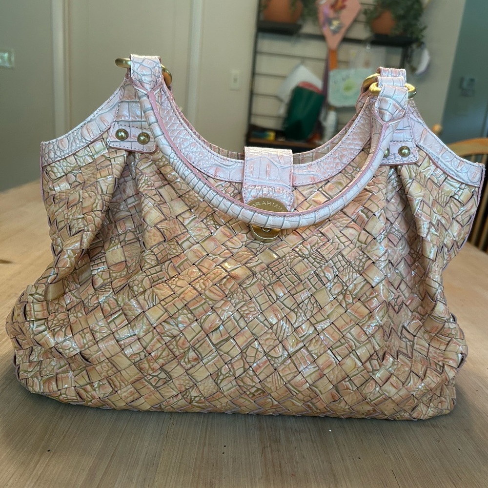 Well-loved pink woven Brahmin bag.